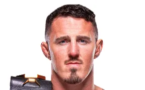 Аспиналл Том фото